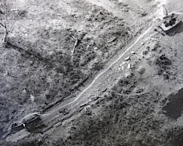 A-PT-76-tank-destroyed-by-American-anti-tank-weapons-lies-dormant-along-a-road-after-the-battle-at-the-Lang-Vei-Special-Forces-Camp