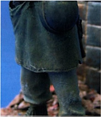 Above: Close-up of the trousers and greatcoat. Note how the dirt looks ground in and blended into the base colour.