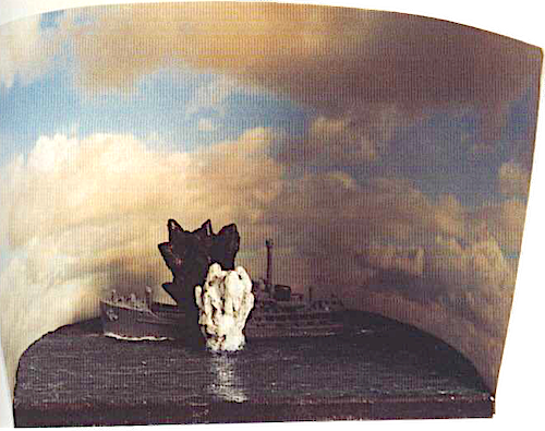 Scenics for the interior. The background is a photograph of blue sky and clouds. The torpedoed merchant $hip is a 1 :1200 scale wargames water­line model with waterspout and deck explosion from Milliput and painted to suit. The torpedo track and ship's bow wave ,were painted on.