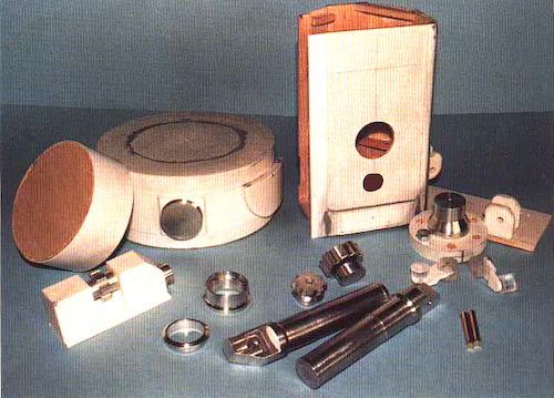 The basic components are made up from wood, plastic sheet, turned aluminium, and other bits and pieces. 